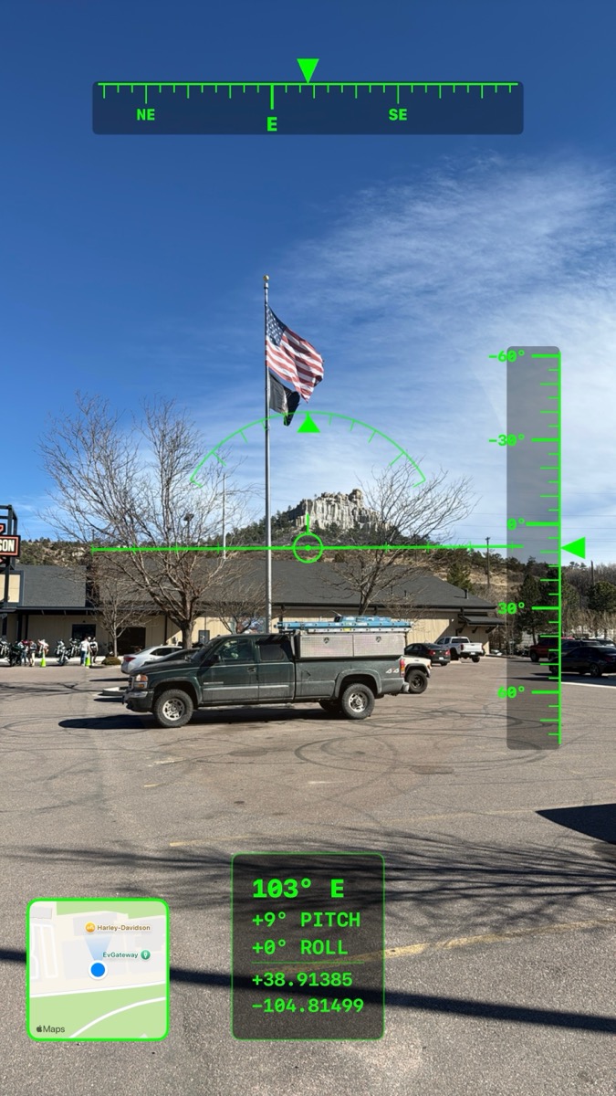 Parking lot with American flag captured with Compass Capture showing heading, tilt, GPS coordinates, and map overlay