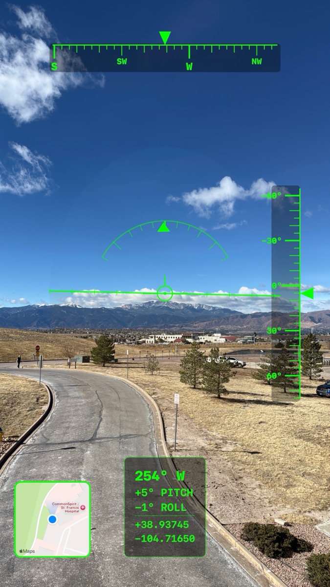 Mountain landscape captured with Compass Capture showing heading, tilt, GPS coordinates, and map overlay